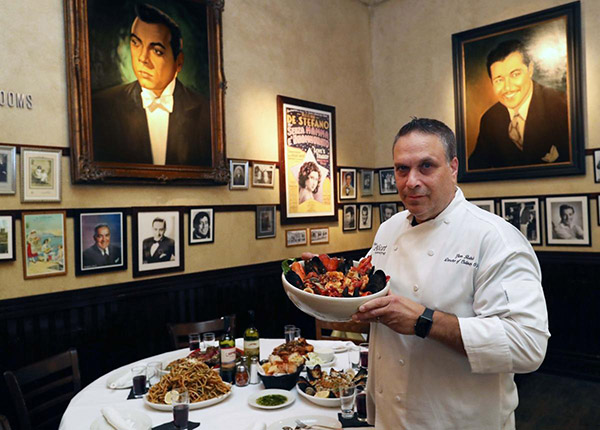 Photo of Glenn Rolnick with italian food