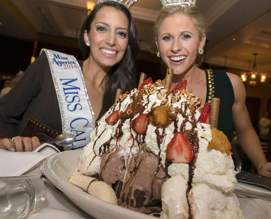 Miss America contestants eating at Carmine's